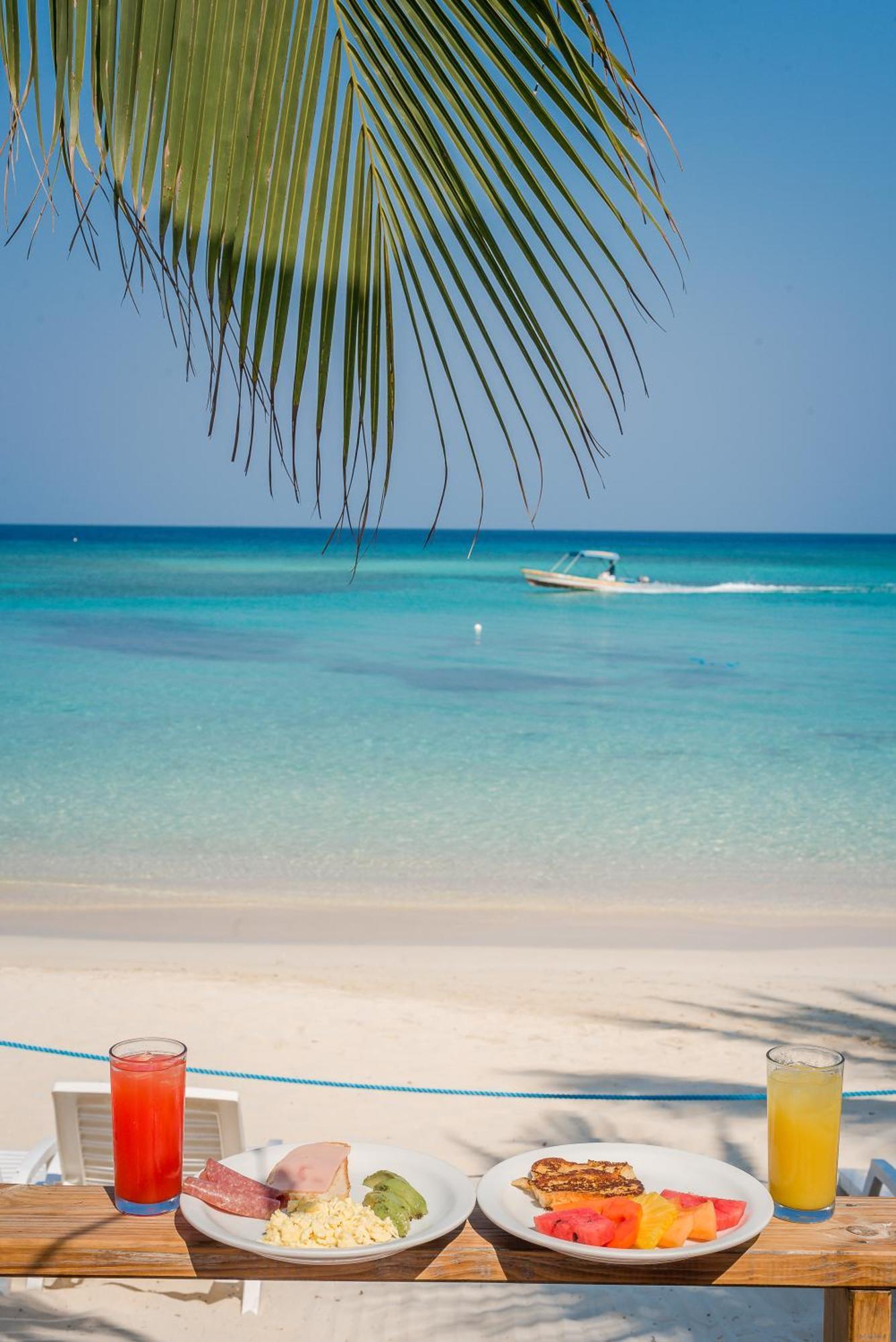Paradise Beach Hotel & Resort West Bay Exterior foto