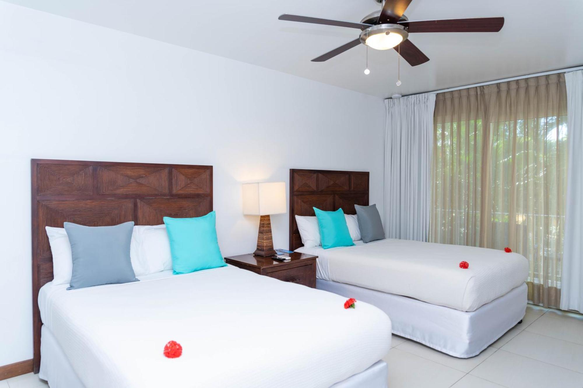 Paradise Beach Hotel & Resort West Bay Quarto foto